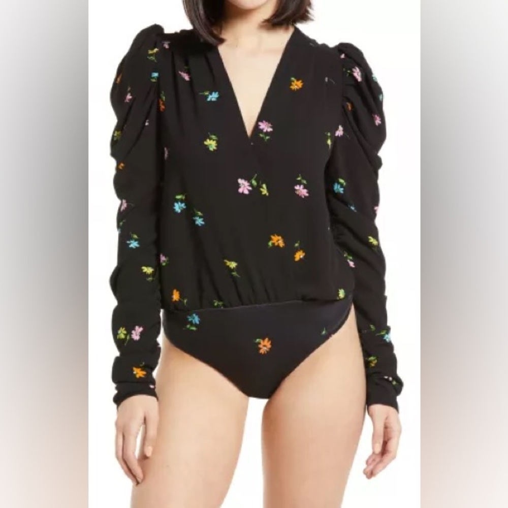 AFRM Dan­na Puff Sleeve Body­suit in Black worn by Nicole War­ren NEW